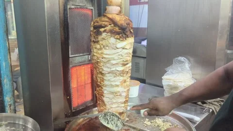 Worker makes spicy shawarma Stock Footage 284756944