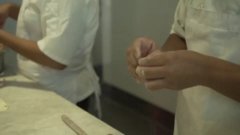Worker making dumplings. Close up. Slow motion.  Video stock 78885272