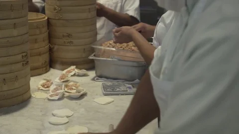 Worker making dumplings. Close up. Slow motion.  Video stock 78885522