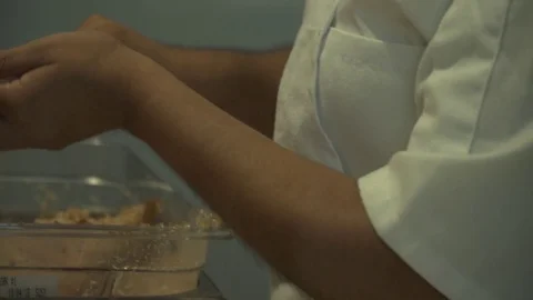 Worker making dumplings. Slow motion. Close up Video stock 78884356