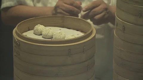 Worker making dumplings. Slow Motion.  Video stock 78886350