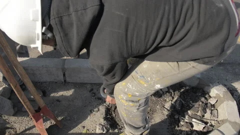 Worker making hole with pneumatic drill Stock Footage 186894438