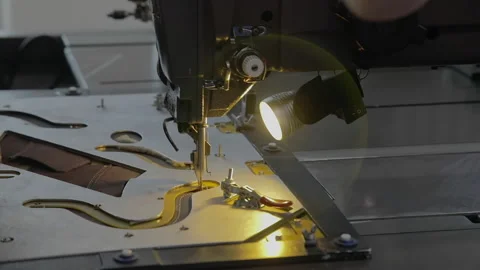 Worker making leather shoes on production line conveyor in production line of Stock Footage 155392060