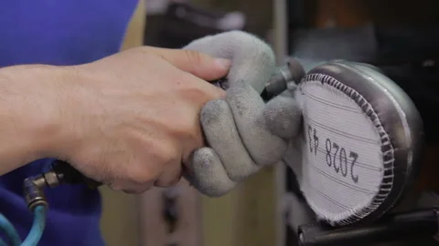 Worker making leather shoes on production line conveyor in production line of Stock Footage 155392832