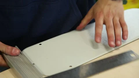 Worker making measurements with a Ruler with angle bar in a steel plate Stock Footage 64120892