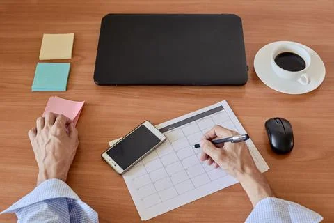 Worker making notes 스톡 사진