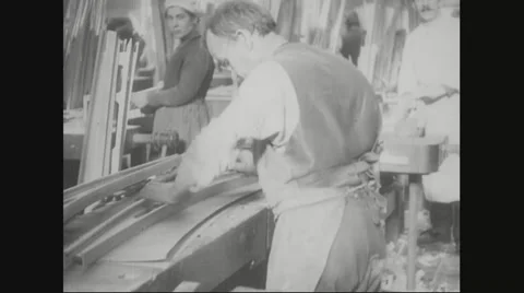 Worker making outline of aircraft wing fillet on paper Stock Footage 43311402