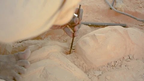 Worker making statue using hammer Stock Footage 102782540