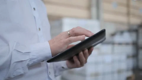 Worker male warehouse worker engineer man in a helmet working on the Video stock 114451205