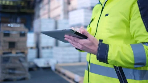 Worker male warehouse worker engineer man in a helmet working on the Stock Footage 147407173