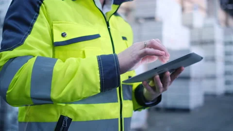 Worker male warehouse worker engineer man in a helmet working on the Stock Footage 148162591