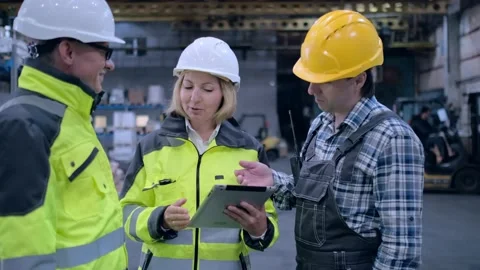 Worker male warehouse worker engineer man in a helmet working on the Stock Footage 172167900