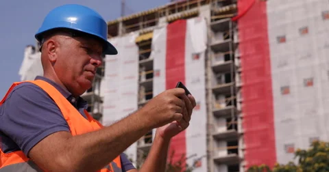 Worker Man Construction Builder Use Mobile Phone Cellphone Texting Building Site Stock Footage 54661068