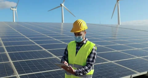 Worker man with digital tablet wearing safety mask 動画素材 149302477