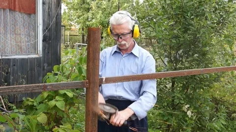 Worker man with electric tool Stock Footage 80330167