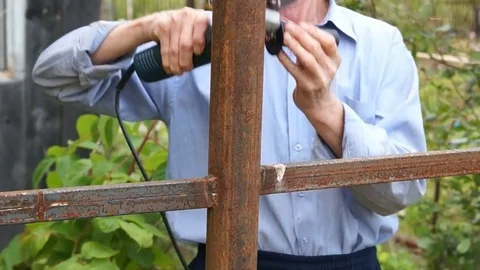 Worker man with electric tool Stock Footage 80330201