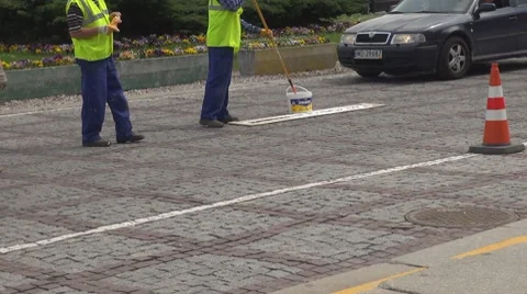 Worker man marking the street Stock Footage 7735448