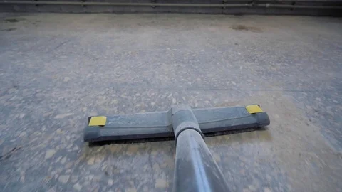 Worker man use vacuum cleaner in construction Stock Footage 127249576