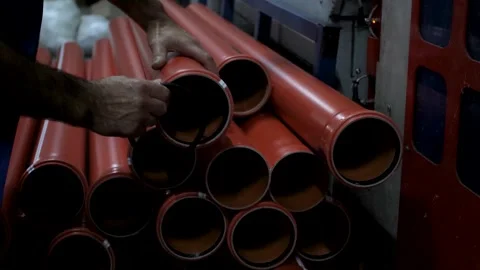 Worker manning a plastic pipe Stock Footage 279841801