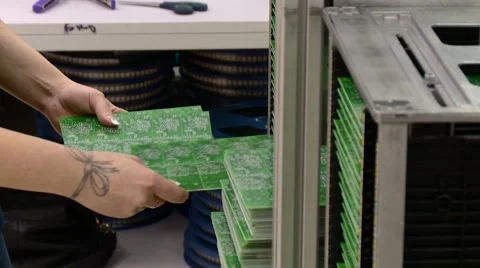 Worker manually sorting circuit boards Video stock 68502249