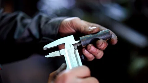 Worker measures the detail Stock Footage 126628693