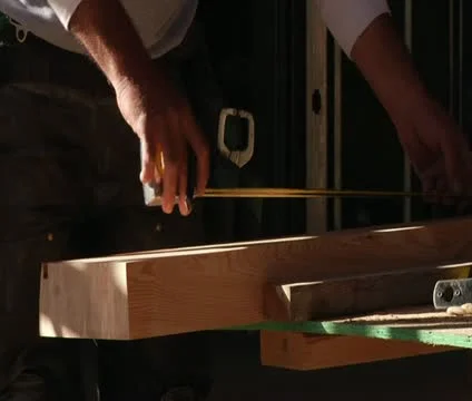Worker measures wood Stock Footage 21559679