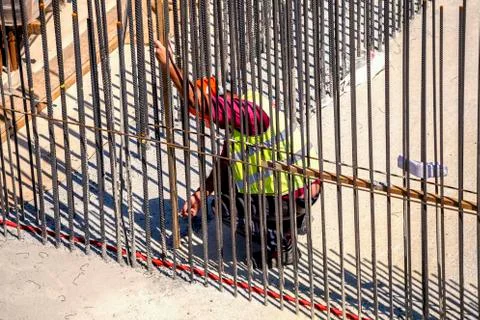 Worker measuring formwork for pouring concrete 3 Stock Photos
