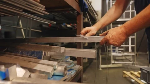 Worker Measuring Metal Bar With Vernier Caliper in Workshop Stock Footage 337190170