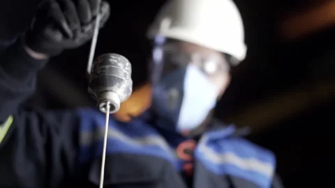 Worker is measuring paint density Stock Footage 146636220