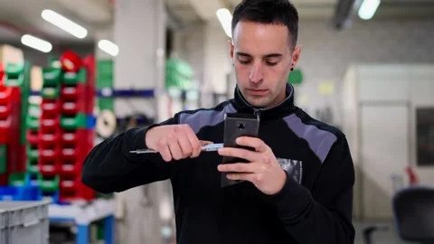 Worker measuring piece of metal in a store Stock-Footage 261224172