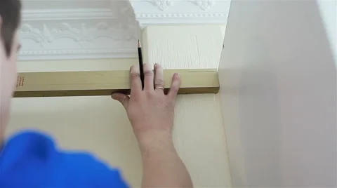 Worker measuring the wall. Close-up. Pan shot Stock Footage 48136493