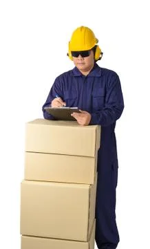 Worker in Mechanic Jumpsuit with stack of boxes and Checking Products isolate Stock Photos