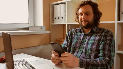 Worker messaging on touch screen mobile Stock Photos