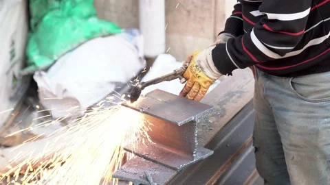 The worker is metal cutting with oxy acetylene Stock Footage 157773154