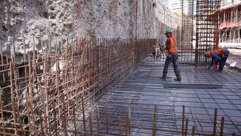 Worker on metal mesh Stock Footage 77100678
