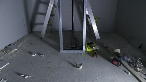 Worker up on a metallic ladder Stock Footage 95776727