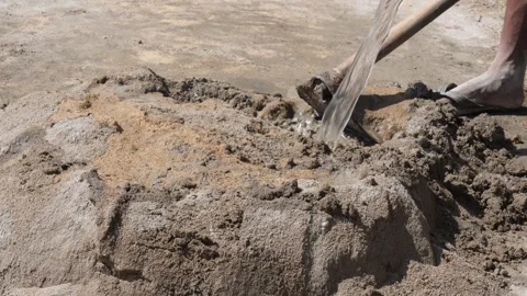 Worker Mixing Cement Stock Footage 336435527