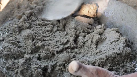 Worker mixing cement mortar 스톡 동영상 332588032
