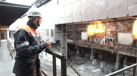 The worker monitors the process of production Stock Footage 61784971