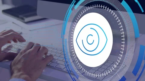 Worker moving mouse then typing, HUD eye overlay rotating, partly covering Stock Footage 334744113