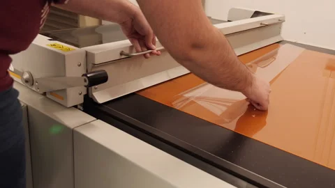 Worker operate digital pre-press flexographic laminating machine Видео 161355015