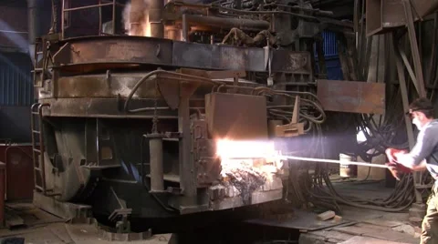 Worker operates in blast furnace workshop of metallurgical plant 库存影片 57095874