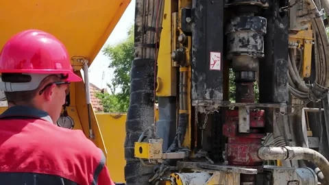 Worker Operates the Drilling Rig Machine Stock Footage 250330983