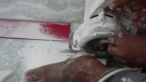 Worker Operating Angle Grinder Video stock 336689732