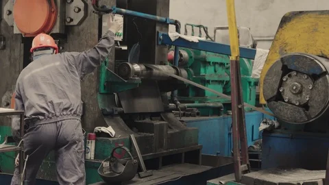 Worker operating machine on control panel in metal industry. Video stock 120981566