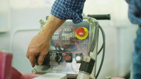 Worker operating machine Stock Footage 87808263