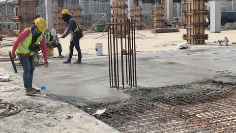 Worker Operating Power Float Machine to Finish Fresh Concrete Floor Stock Footage 344562390