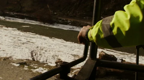 Worker operating a wrench on train Stock Footage 47350462