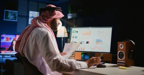 Worker optimizing performance indicators Stock Photos