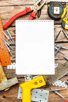 Worker or engineer notebook. Tools on the table before work. Beginning of wor Foto stock